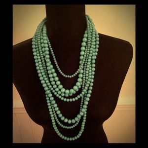 Multilayered Green Beaded Necklace.